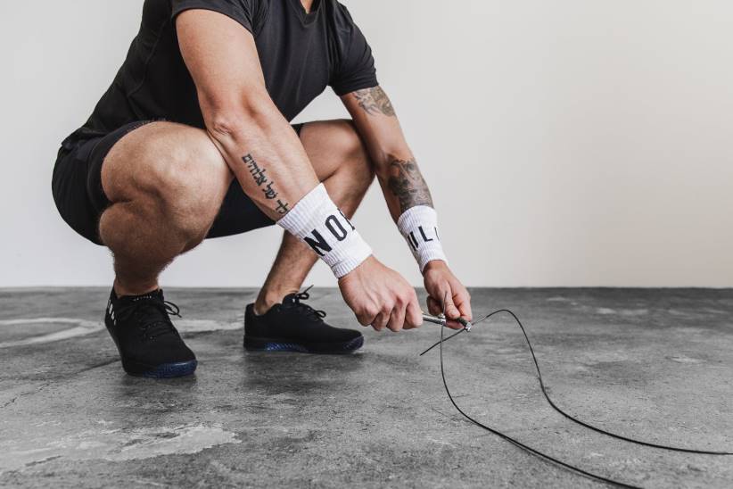 NOBULL 80NJ2948cinturini da polso (mimetici) bianchi