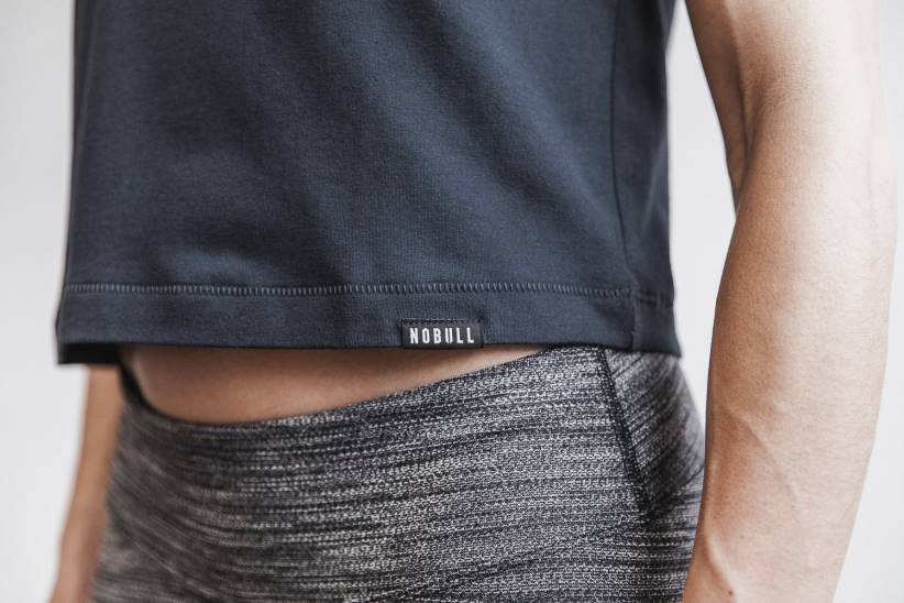 NOBULL 80NJ2463T-shirt corta senza maniche da donna dei pesi massimi