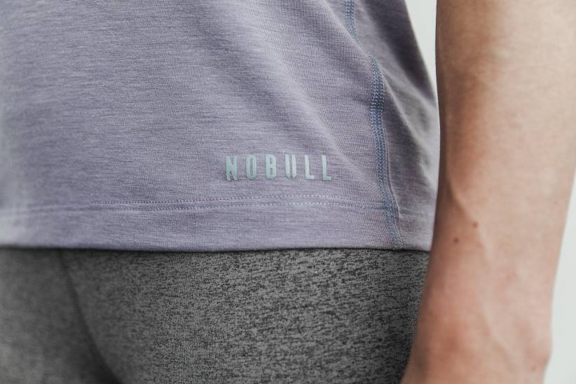 NOBULL 80NJ2699canotta a collo alto da donna (colore stagionale)