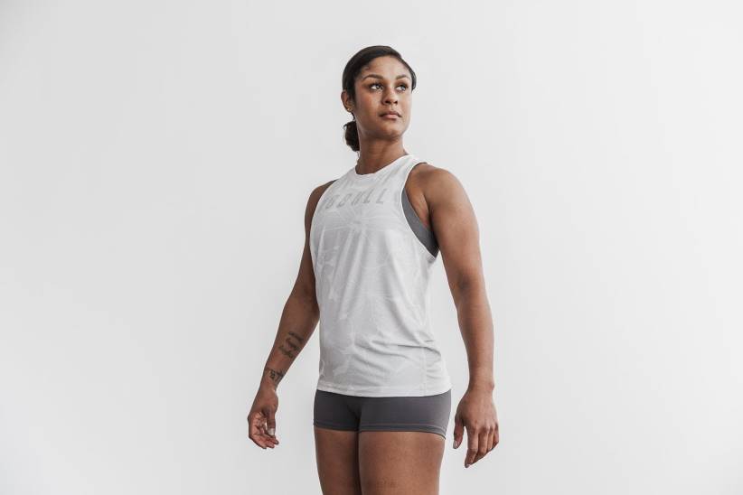 NOBULL 80NJ1797canotta da donna a collo alto (ibisco) di colore bianco