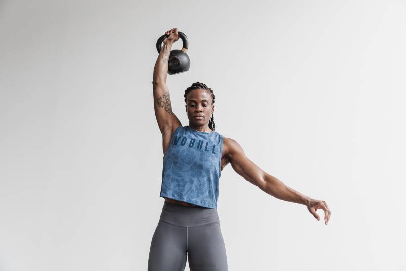 NOBULL 80NJ1807canotta muscolare femminile (fiore di ciliegio) costiera