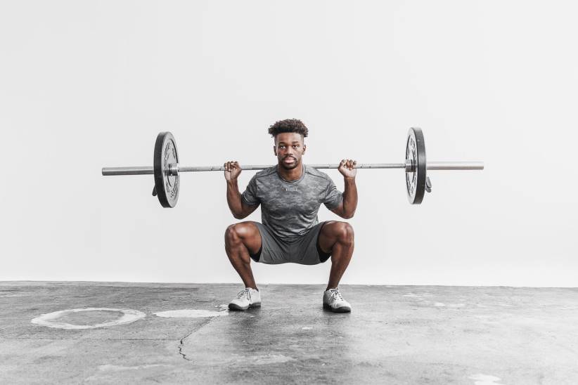 NOBULL 80NJ901maglietta leggera testurizzata da uomo (mimetica) nera