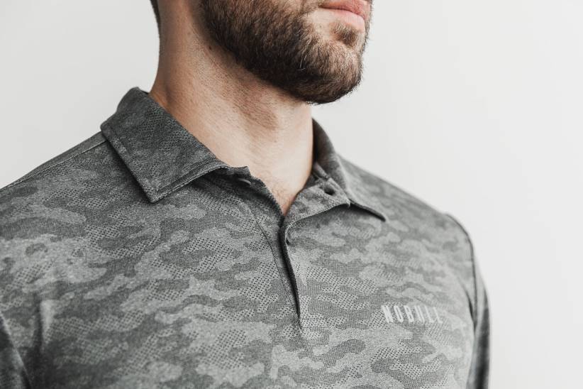 NOBULL 80NJ575polo testurizzata leggera da uomo (mimetica) nera